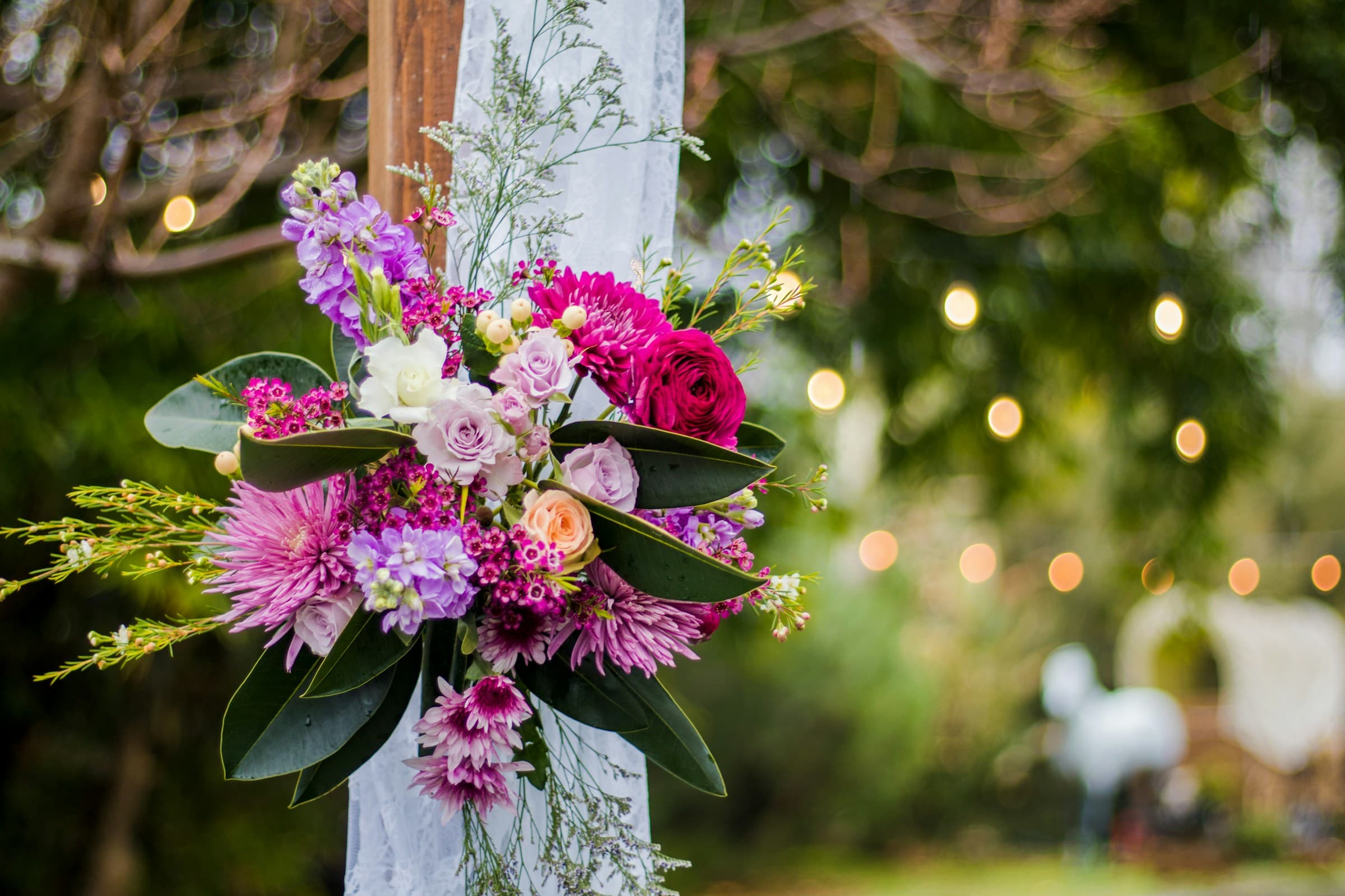 Detail of a wedding arch's foliage and flowers